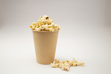 Popcorn in a cup on a white background