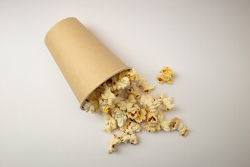Popcorn in a cup on a white background