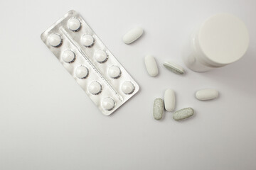 Medical pills on a white background