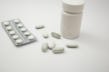 Medical pills on a white background