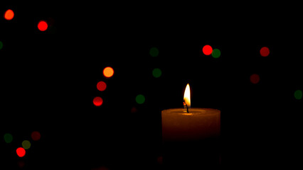 Warm candlelight on a dark mysterious background