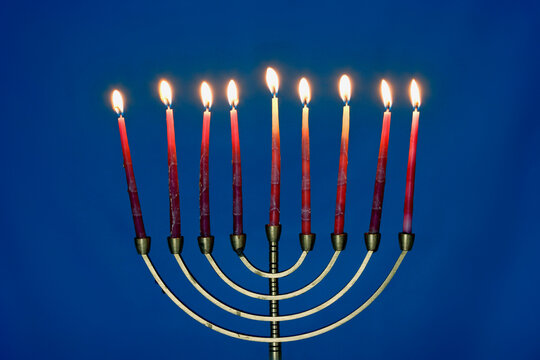 Close-up of lit candles on a menorah