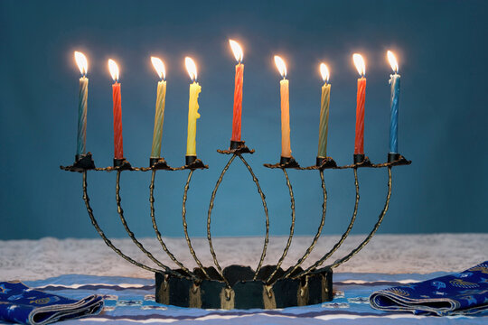 Close-up of lit candles on a menorah