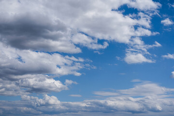 Blue sky background with clouds.