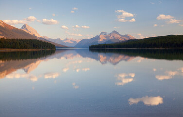 Reflection of clouds in a lake, Maligne Lake, Jasper National Park, Alberta, Canada