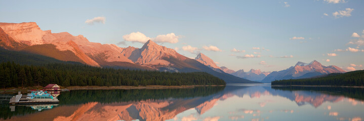Reflection of mountains and clouds in a lake, Maligne Lake, Jasper National Park, Alberta, Canada