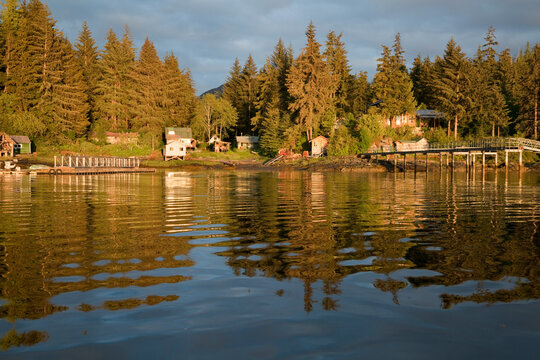 Houses at the waterfront at sunset, Meyers Chuck, Alaska, USA