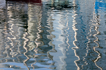 Abstract reflections of sailboats in water, Seaport Village, San Diego, California, USA