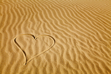 Heart shape drawn on sand on the beach, Pacific Beach, Washington State, USA