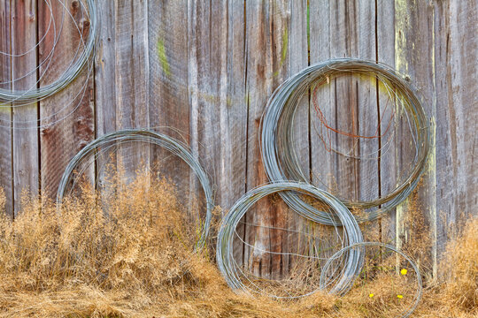 USA, Washington, Silverdale, Historic Petersen Farm, Wire coiled on wall