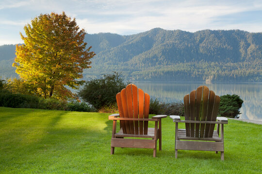 Adirondack chairs in a lawn at the lakefront, Lake Quinault Lodge, Quinault, Olympic National Park, Washington State, USA