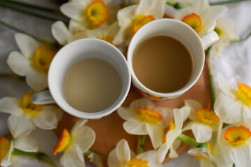 Breakfast table seating with coffee cup and milk