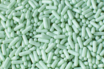 Close-up of green pills