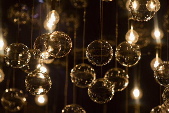 Close-up of lit up bulbs and bubbles