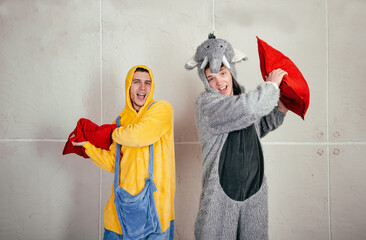 Pajama party of beautiful men. Pillow game.