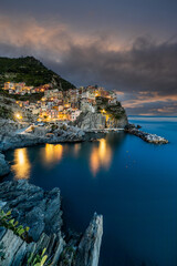 Sunset over the sea at Manarola, Cinque Terre, Italy.