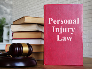 Personal injury law is shown using the text on the book
