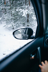rear view in the side mirror of the car
