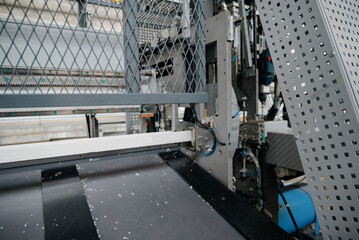 Factory for aluminum and PVC windows and doors production. Details industrial equipment.