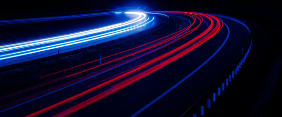 Night road lights. Lights of moving cars at night. long exposure red, blue, green, orange.