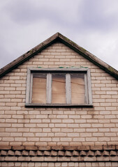 facade of an old rural brick house
