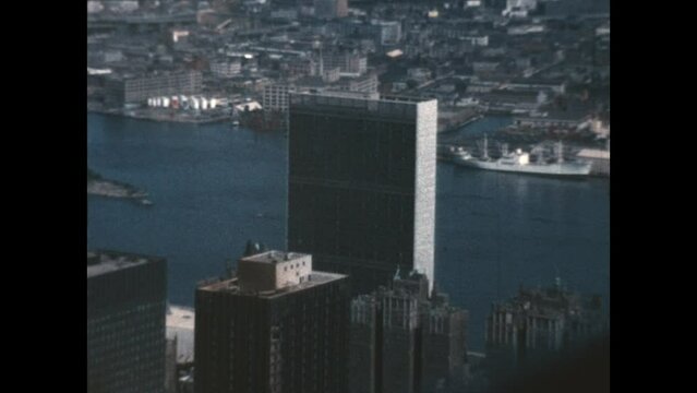 East River NYC 1963 - Pan of the East River past the buildings in Manhattan. Shows the industry and ports along the river  