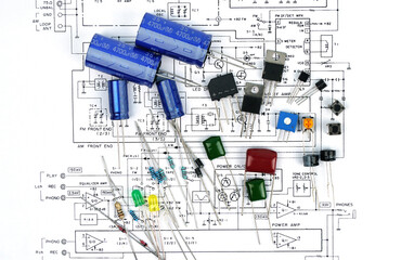 Details of an electronic device with electronic diagram, electrical circuit,  transistors, capacitors, resistors.                  