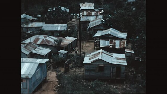 Shanty Town Puerto Rico 1958 - Shanty town with aluminum siding in the lush tropical heat of the island in Aguadilla  
