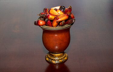 Pine fruits from the araucaria angustifolia tree in a mate bowl. Gaucho Culture. Araucária fruits closeup