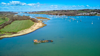Aerial landscape image of River Median with Cowes in the background on a sunny day
