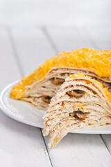 Lasagne with mushrooms. Photo of food on a white background