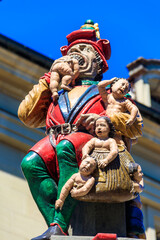 Child Eater Fountain (Kindlifresserbrunnen) is a painted stone fountain in old city of Bern,...