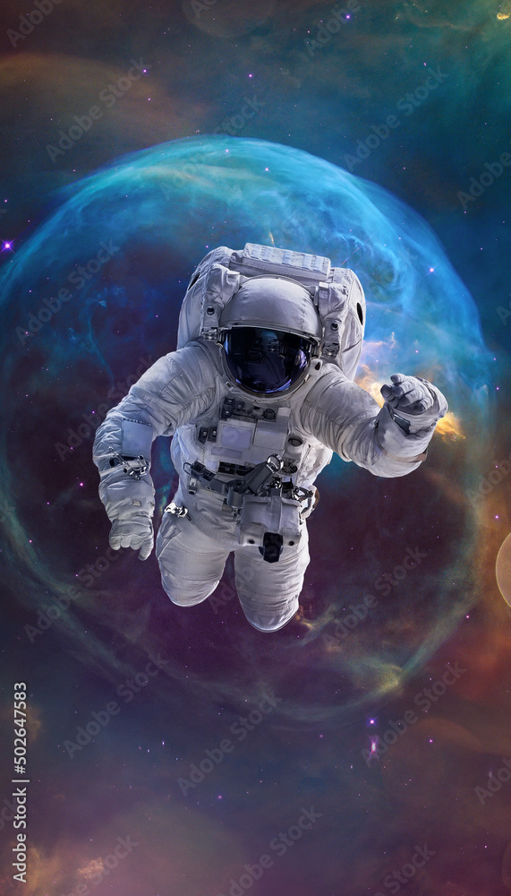Wall mural astronaut in space. galaxy and nebula space art. vertical 16:9 wallpaper with spaceman. elements of 