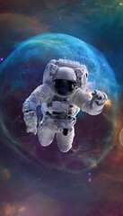 Astronaut in space. Galaxy and Nebula space art. Vertical 16:9 wallpaper with spaceman. Elements of...