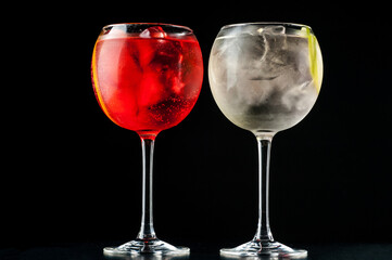 Cocktail with ice.  Mojito, aperol, soda, vodka, alcohol, martini.  Summer, cocktail, beach.  Cocktail on a black background.  Mint with lemon and ice.  Refreshing cocktail in hot weather