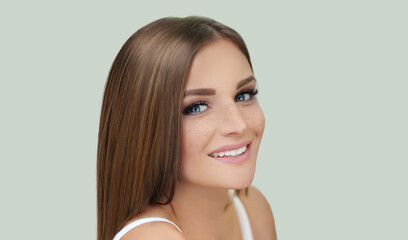 Freckles. Portrait of a young blond girl with blue eyes