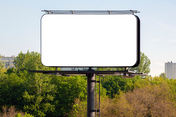 Blank white billboard for advertisement near city park