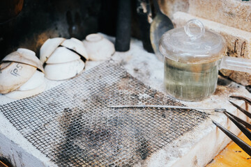 Jeweler workplace. Place for soldering. Desktop for craft jewelry making with professional tools.