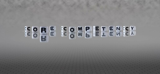 core competency word or concept represented by black and white letter cubes on a grey horizon...