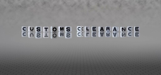 customs clearance word or concept represented by black and white letter cubes on a grey horizon background stretching to infinity - obrazy, fototapety, plakaty