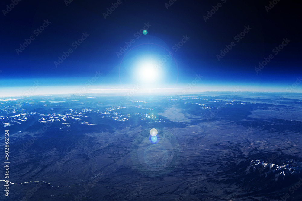 Sticker sunrise over the planet from space. elements of this image furnished by nasa