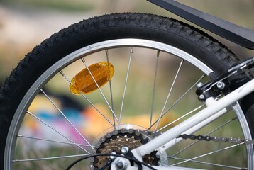 Cycling and bicycle safety, reflective light on the bike.