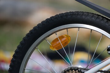 Cycling and bicycle safety, reflective light on the bike.