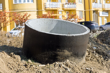 Preparation for industrial building construction with stacked concrete drainage pipes