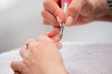 Professional hardware manicure using automatic electric manicure drill polish remover for nail, Manicure, Nails Polish Procedure, hardware manicure, electric nail