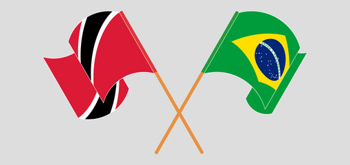 Crossed and waving flags of Trinidad and Tobago and Brazil