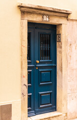 Fototapeta na wymiar Beautiful blue front door in Lisbon