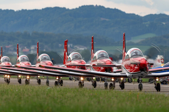 Payerne, Switzerland - August 29, 2014: Swiss Air Force PC-7 display team flying Pilatus PC-7 trainer aircraft.