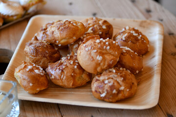 Chouquettes French light cakes sprinkled with sugar