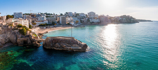 Fototapeta premium Aerial view of the capital of Mallorca - Palma de Mallorca in Spain. A touristic city by the sea.